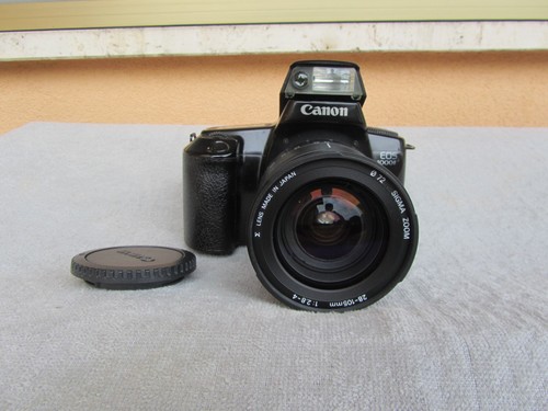 Canon eos 1000 sigma zoom - ,